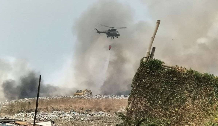 菲律宾一垃圾填埋场连日火灾导致严重雾霾